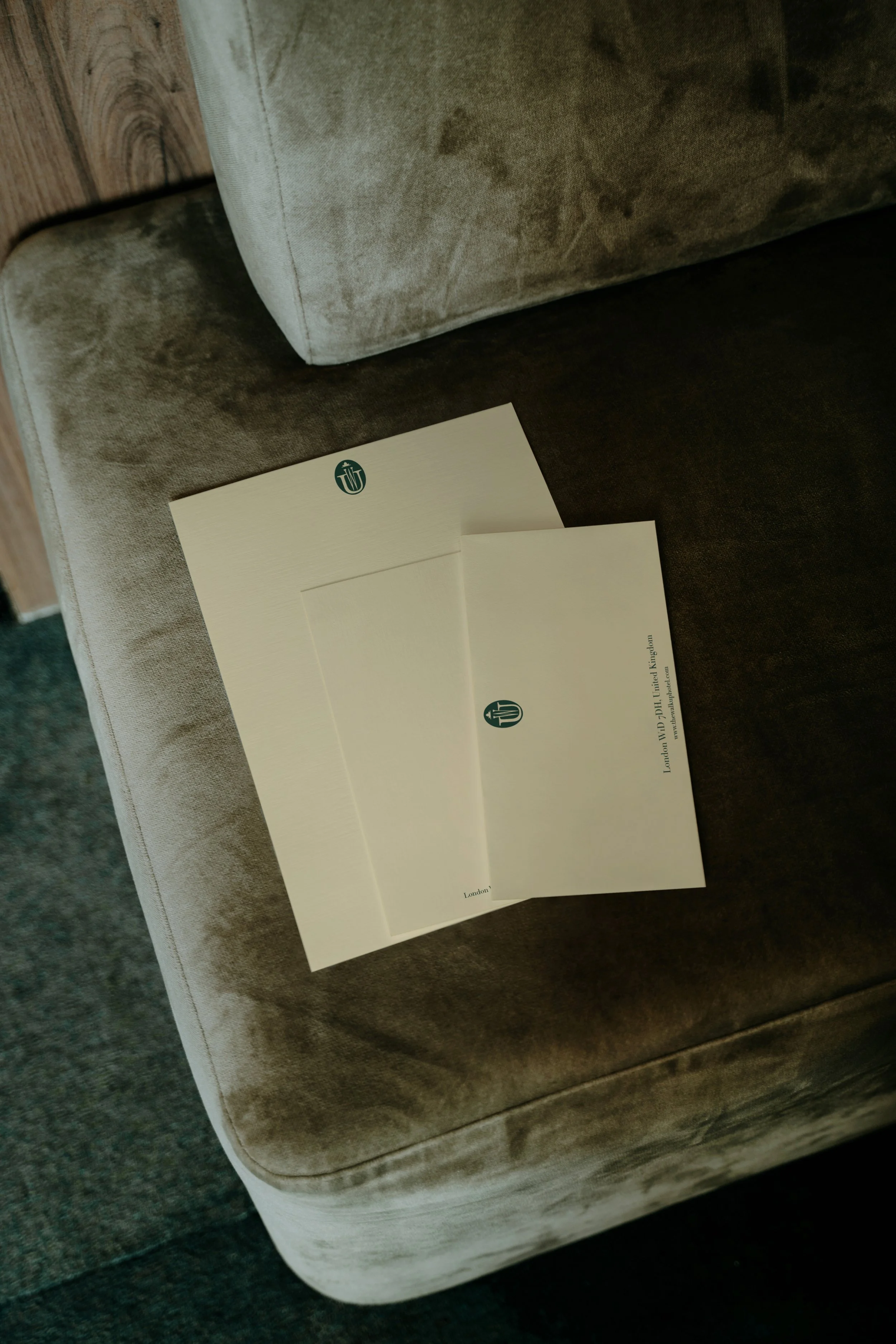 Letterhead stationery on a velvet chair